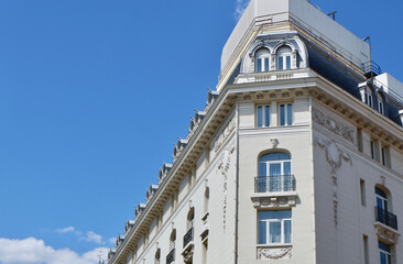 Corner of classical white building in La Latina district downtown Madrid, Spain