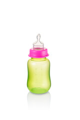 Small green baby bottle, with pink ring without cap, isolated 