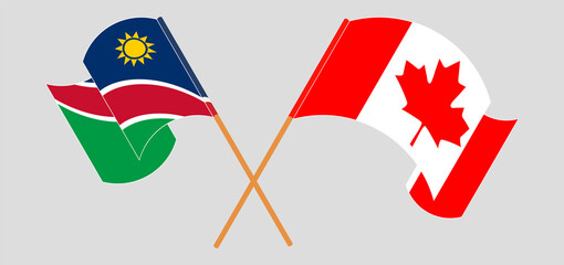 Crossed and waving flags of Namibia and Canada