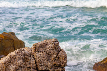 waves crashing on rocks