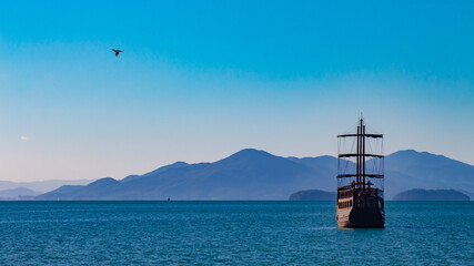  pirate ship in the blue sea in a sunny day in Florianópolis, Santa Catarina, Brazil