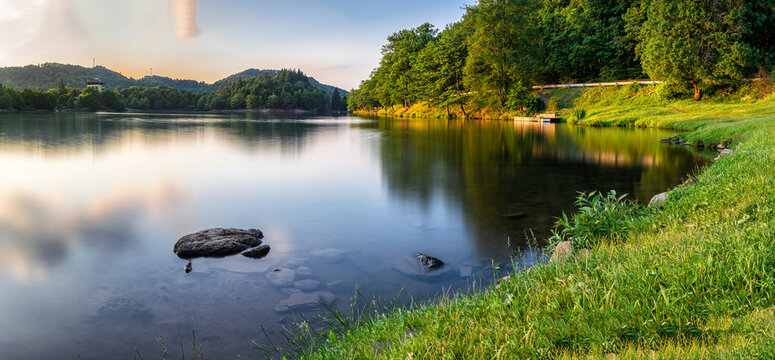 Panoramatic photo of lake in suset light