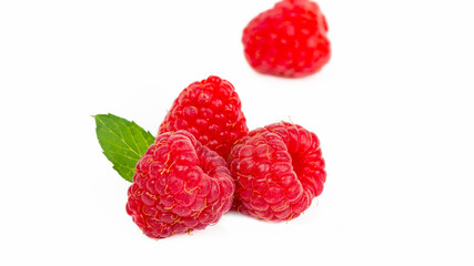 raspberries with mint isolated on white background