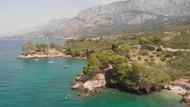 4k aerial video of blue lagoon, island paradise. Beautiful bay near Podgora town, Makarska rivera, Dalmatia, Croatia
