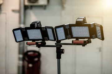 The panel led lighting with lamps on tripods