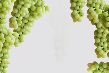large bunches of green grapes on a white background