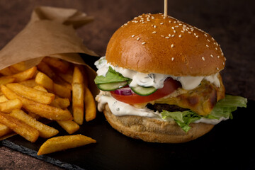 Burger with meat and french fries