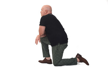 rear and side view of man leaning on one knee on the ground on white background