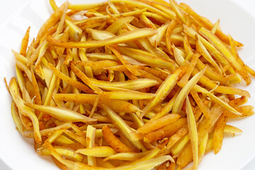 Sliced finger root on white background.