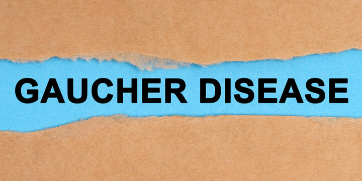 The paper is ripped in the middle. Inside on a blue background it is written - Gaucher Disease