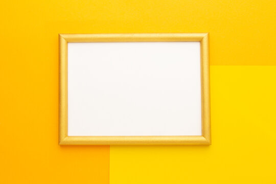 Frame on a yellow background. Copy space. View from above