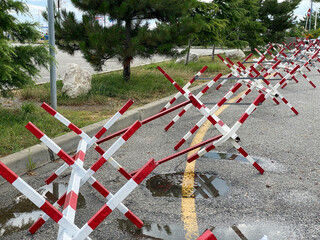 Hedgehog Roadblock. The Czech hedgehog on the road. White and red © rus12eng