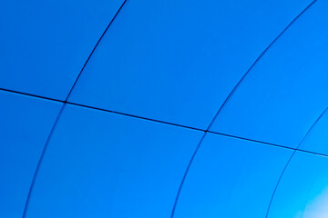 blue background with intersecting semicircular lines