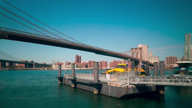 brooklyn bridge sunny day water taxi dock 4k time lapse from new york