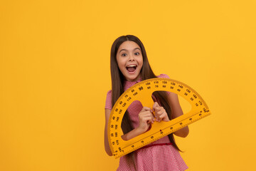 surprised kid study math in school hold protractor ruler, mathematics