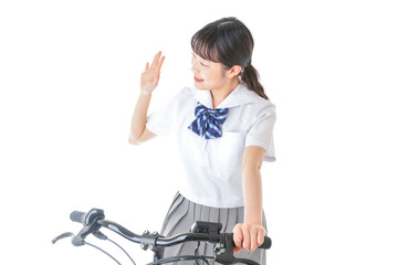 自転車通学をする制服姿の学生