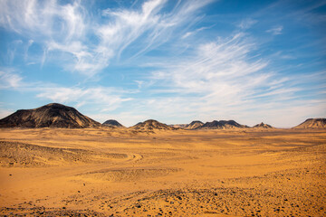 Fototapeta na wymiar Blue sky above the Black desert, Egypt.