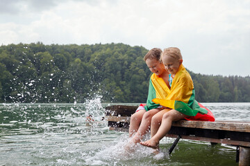 spending summer time with kids on lithuanian lakes