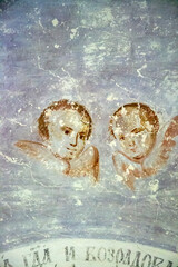 drawings on the walls of an abandoned Orthodox church