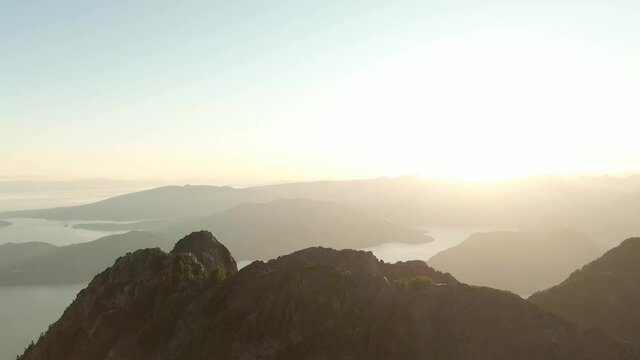 Aerial View of Rocky Canadian Mountain Landscape. Sunny Summer Evening. Sight from Mnt Brunswick, near Vancouver and Squamish, British Columbia, Canada.