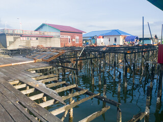 a house on water that burns and leaves wood charcoal