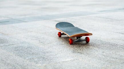 One skateboard on city floor