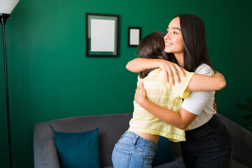 Friends sharing saying how much they love each other