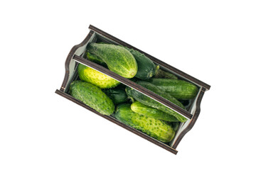Top view of a box of cucumbers isolated on a white background. Flat lay.