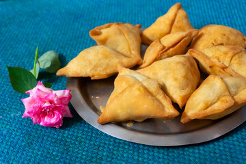 Homemade Samosa, samsa or smosa. A vegetarian spicy Indian special traditional street food. Iftaari dish, Selective focus.