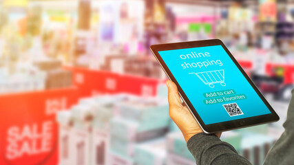 Man's hands holding laptop online shopping website on a laptop, easy e-commerce shop digital payment, gateway center the background, Concept of buying online using mobile devices