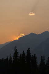 Setting Sun Sinking behind the Mountain