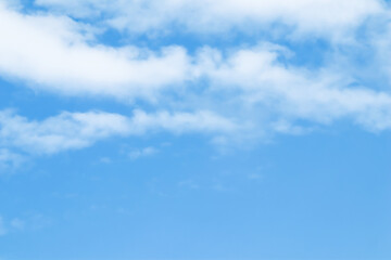 Background of blue sky with white clouds.