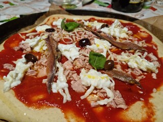 Italian's pizza with tuna and anchovies