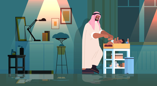 Sad Arab Father Changing Diaper To His Little Son Fatherhood Parenting Concept Dark Night Home Living Room Interior