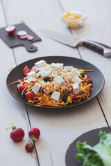 Pumpkin bowls with figs, mozzarella, cherry tomatoes and mint