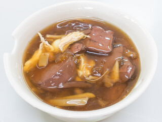 Fish maw soup with crab meat and chicken in bowl