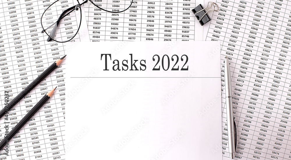 Poster paper with tasks 2022 action plans on a table