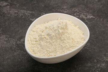 Wheat flour heap in the bowl