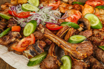 Grilled various meat mix vith vegetables