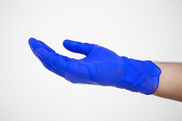 Human hand in Medical gloves in holding position
