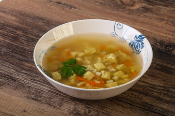 Tasty chicken soup with carrot