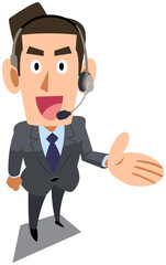 紹介するヘッドセットを装着したスーツ着用の男性
