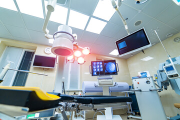 Stylish modern surgical technology room. Emergency surgery monitors in hospital.