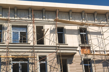 Finishing works on the facade of a new residential buildings