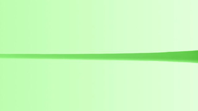 Matcha green tea creamy souce pouring slow motion.