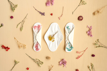 Reusable eco natural pad with flowers.