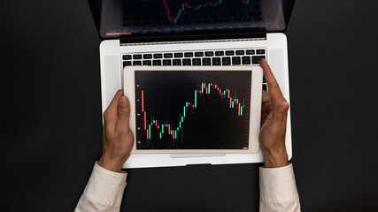 Office desk. Investment business technology app on digital screen. Finance application for sell,...