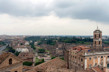 Fototapeta na wymiar The ruins of the Roman Forum in Rome with the Palazzo Senatorio
