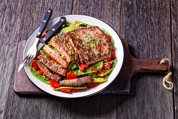 grilled Beef Flank Steak with braised vegetables
