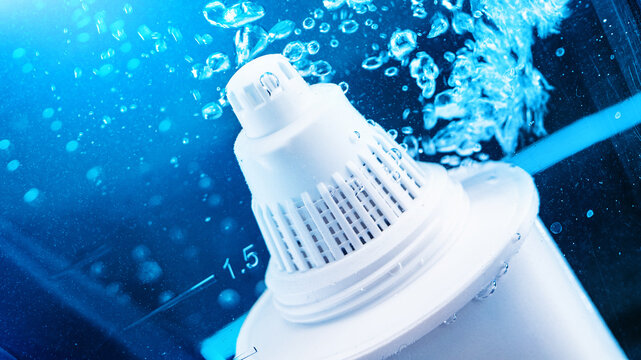 Cartridge of a water filter. Clean drinking water for the home. Water purification filter close up